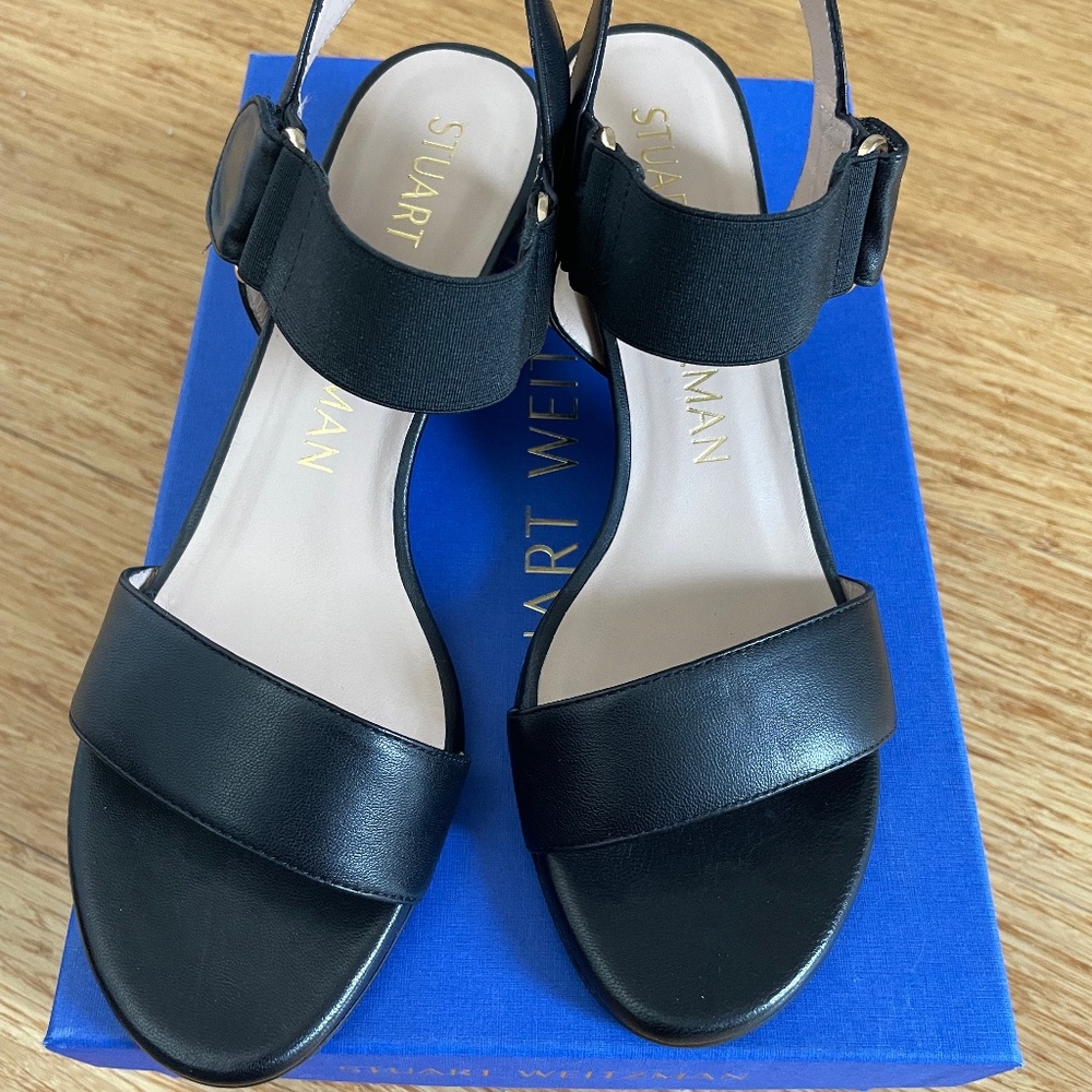 Black sandals by Stuart Weitzman